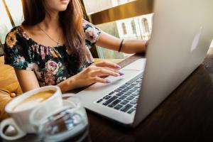 Using a laptop in a café